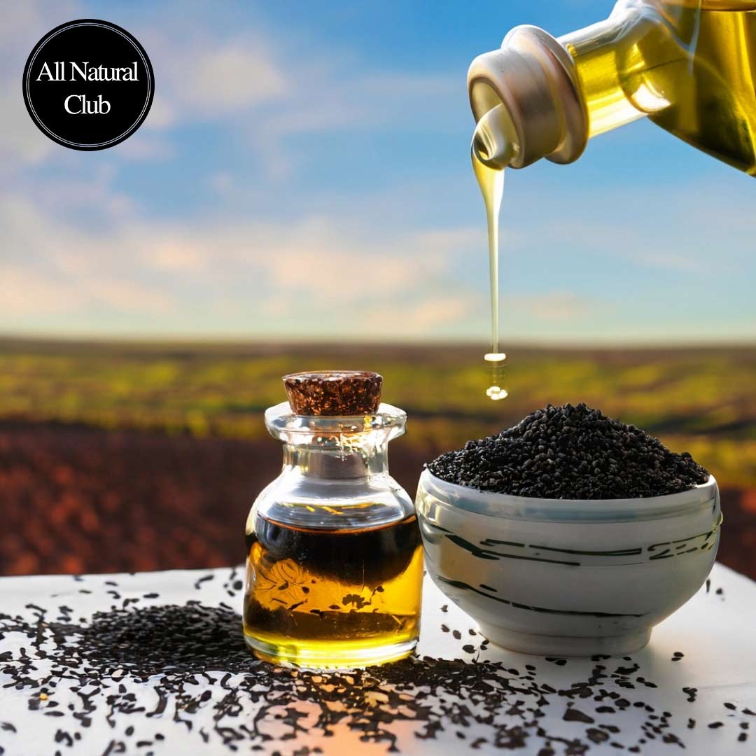 Image of Black Cumin Seed Oil being poured into small ornate glass jars with Black Cumin Seeds in a bowl on the table and with beautiful sky in the background